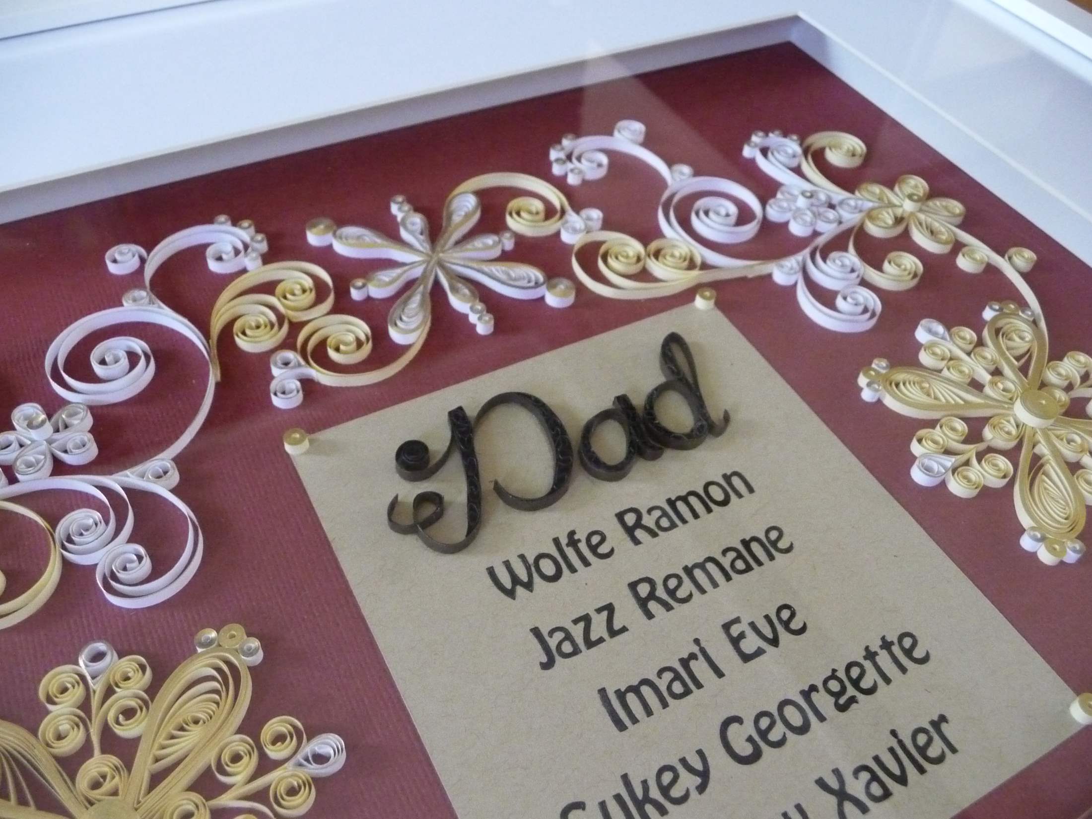 Quilled gold flowers swirls